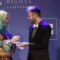 Kesha receives her Visibility award from fellow performer Stephen Wrabel at the 21st Annual HRC Nashville Equality Dinner that honored Kesha at the Renaissance Hotel on Saturday, March 5, 2016, in Nashville, Tenn. 