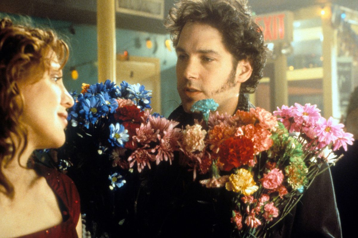 Paul Rudd holds a bouquet in 200 Cigarettes 