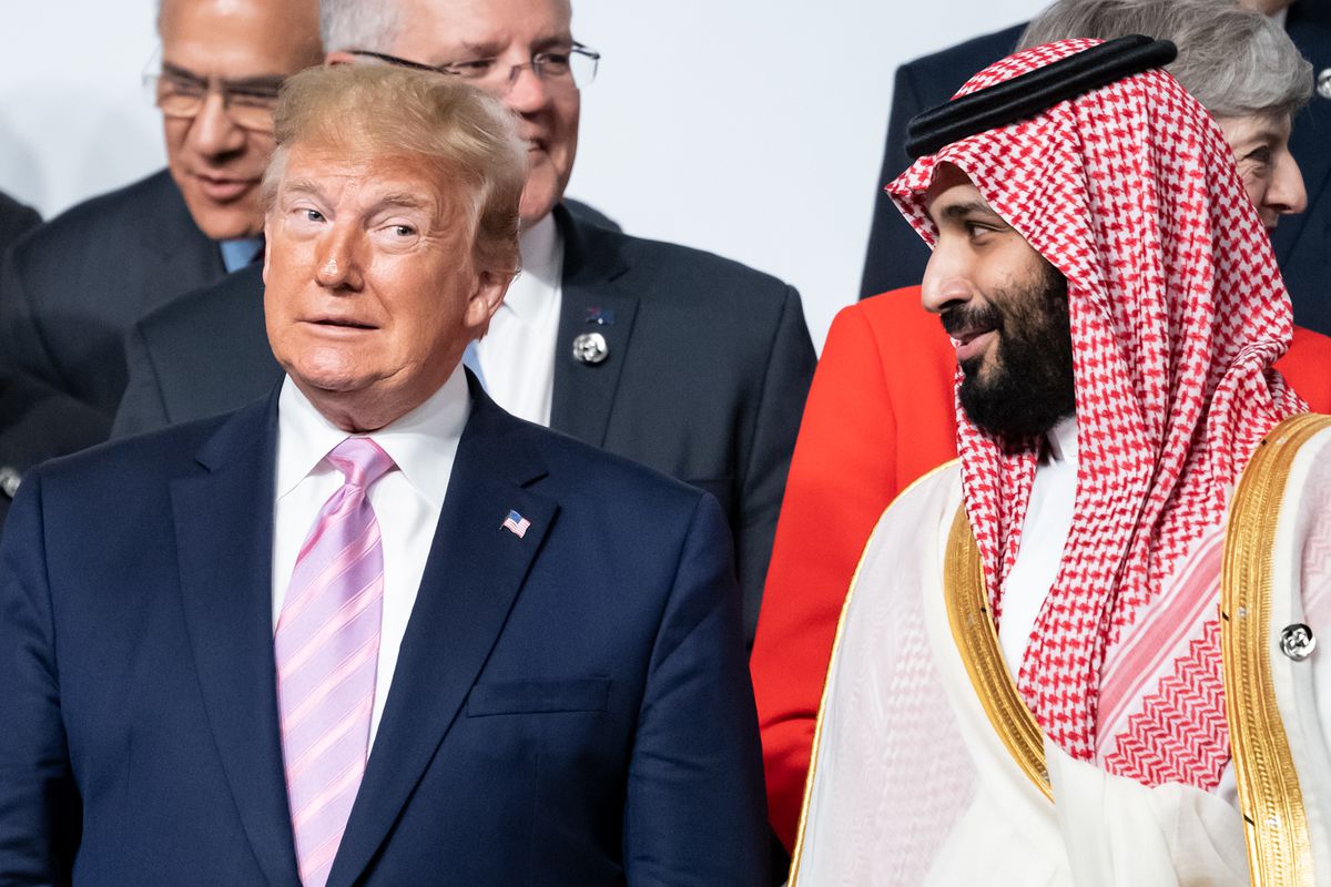 President Donald Trump and Mohammed bin Salman, the crown prince of Saudi Arabia, stand side by side in the group picture at the G20 summit on June 28, 2019.