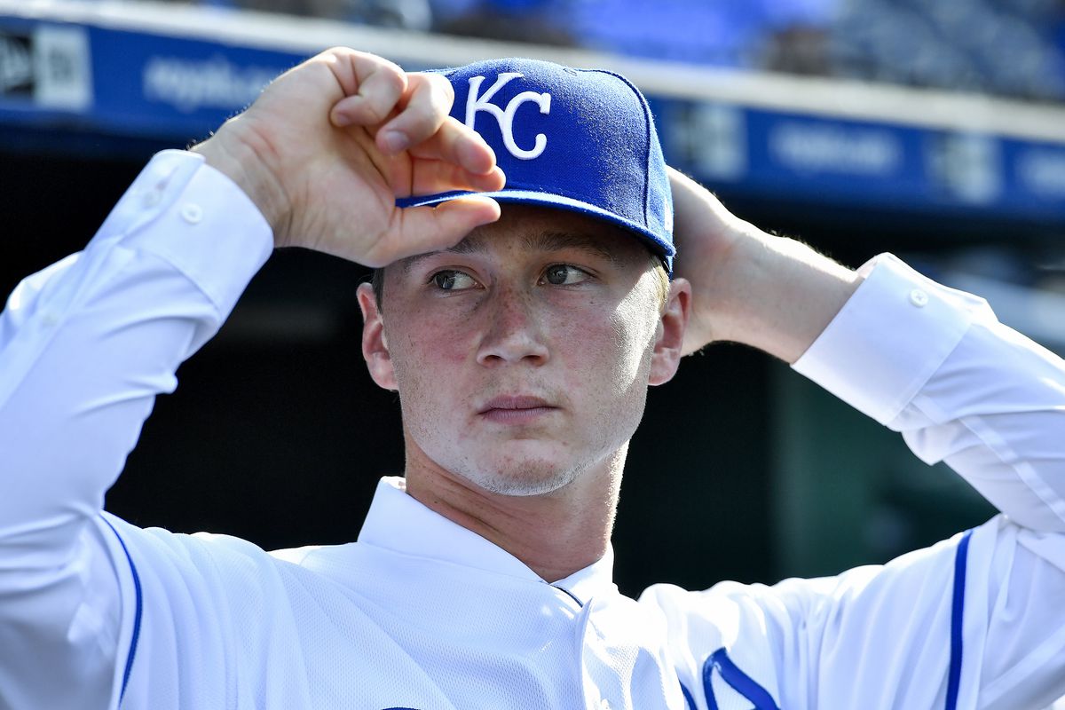 Right-handed pitcher Brady Singer, the Kansas City Royals’ top pick of the 2018 draft, adjusts his hat after a news conference announcing his signing before a game on Tuesday, July 3, 2018, at Kauffman Stadium in Kansas City, Mo.