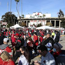 Utah and Ohio State fans walk around before the 108th Rose Bowl game in Pasadena, Calif., on Saturday, Jan. 1, 2022.