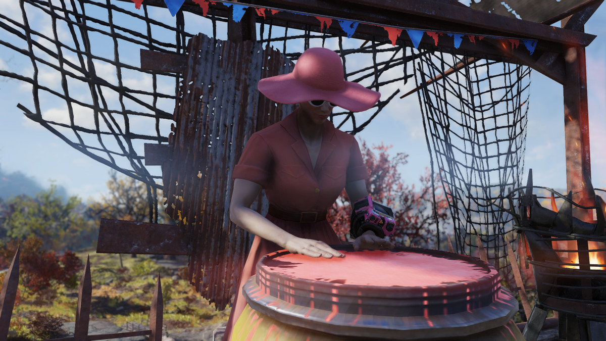 Fallout 76 - a woman in a pink dress and sunhat plays the drums on a barrel.