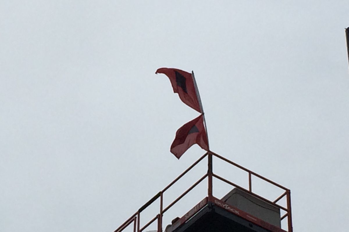 Hurricane flags fly over FSU practice
