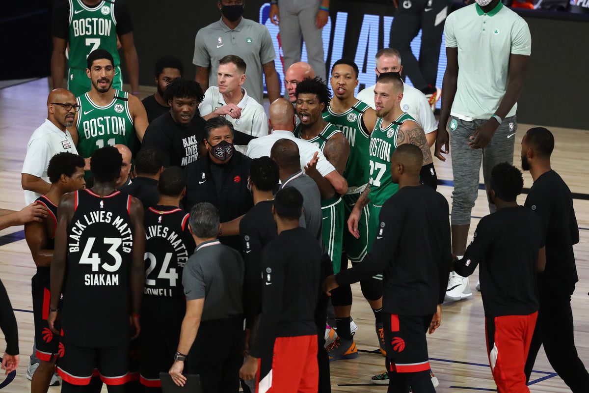 Boston Celtics guard Marcus Smart talks with the Toronto Raptors after the game in game six of the second round of the 2020 NBA Playoffs at ESPN Wide World of Sports Complex.&nbsp;