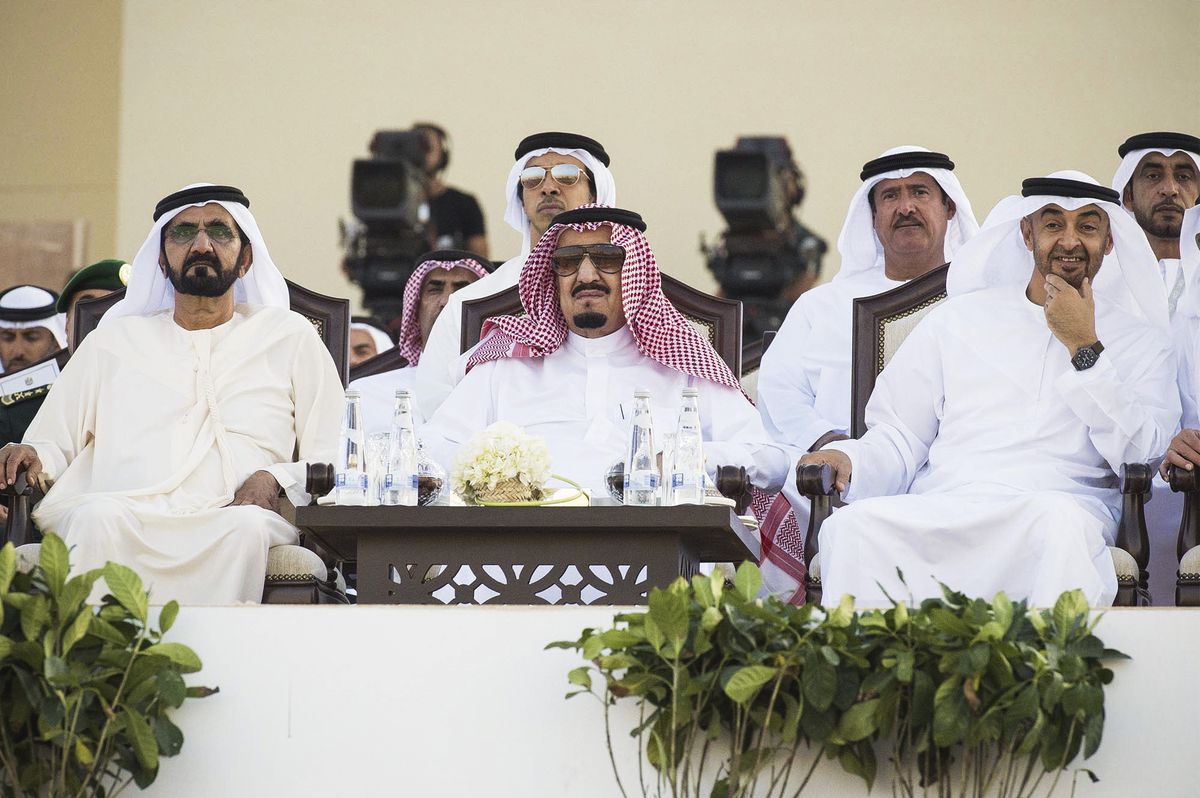 Saudi King Salman bin Abdulaziz al-Saud (center) sitting next to UAE Prime Minister Sheikh Mohammed bin Rashid Al Maktoum (right)