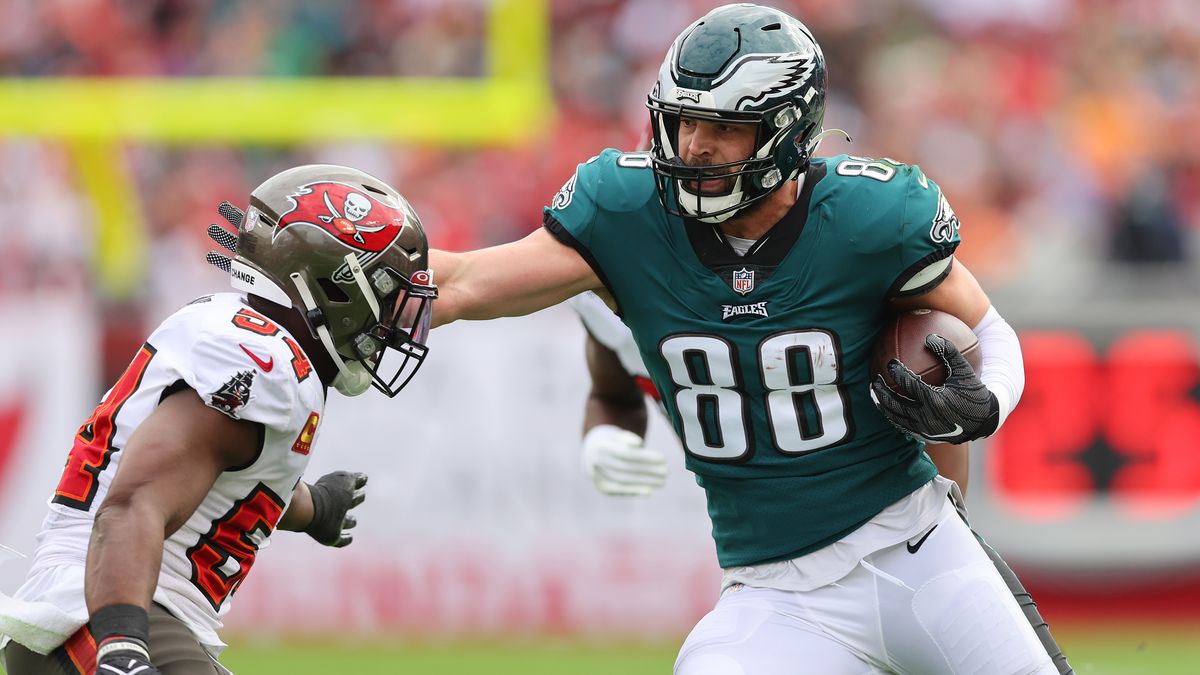 Dallas Goedert #88 of the Philadelphia Eagles runs with the ball after a reception against the Tampa Bay Buccaneers in the first half of the NFC Wild Card Playoff game at Raymond James Stadium on January 16, 2022 in Tampa, Florida.