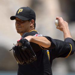 Pittsburgh Pirates starting pitcher Charlie Morton throws to the plate during the first inning of their baseball game against the Los Angeles Angels, Sunday, June 23, 2013, in Anaheim, Calif. 