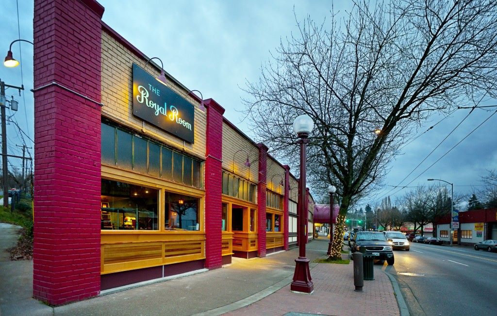 Pictured is the exterior of The Royal Room, a chill cocktail venue in Columbia City.