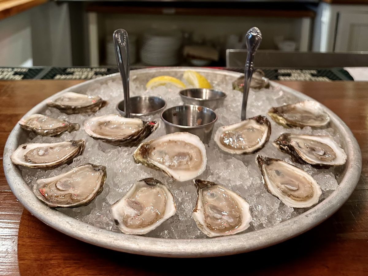 An icy tray of oysters ready to slurp at the bar at Carrie Nation.