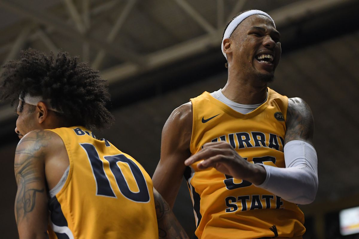 Murray State Racers guard Tevin Brown (10) and forward DJ Burns (55) celebrate a 3 pt shot from guard Rod Thomas (25) against the Belmont Bruins during second half at CFSB Center.