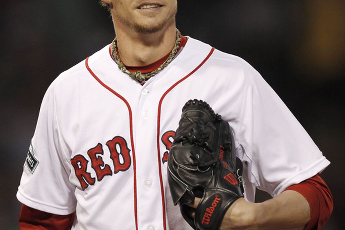 BOSTON, MA:  Clay Buchholz #11 of the Boston Red Sox smiles as he comes off the mound at the end of the fourth inning of the game against the Baltimore Orioles at Fenway Park in Boston, Massachusetts.  (Photo by Winslow Townson/Getty Images)