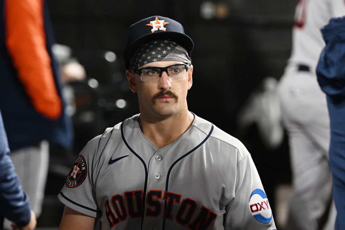 J.P. France #68 of the Houston Astros looks on in the dugout with teammates after being relieved in the seventh inning against the Chicago White Sox at Guaranteed Rate Field on May 12, 2023 in Chicago, Illinois.