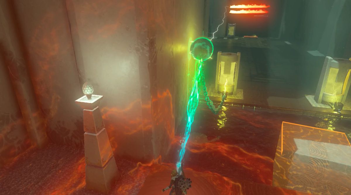 Link lifts an electrified ball in the Tadarok Shrine Fire and Water challenge in Zelda: Tears of the Kingdom