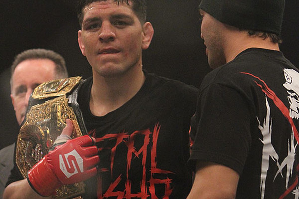 Nick Diaz def. Evangelista Santos by Submission (Armbar) - photo by Scott Peterson, <a href="http://mmaweekly.com/" target="new">MMAWeekly.com</a>