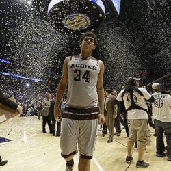 Texas A&M's Tyler Davis (34) walks off the court after an NCAA college basketball game against Kentucky in the championship of the Southeastern Conference tournament in Nashville, Tenn., Sunday, March 13, 2016. Kentucky won 82-77 in overtime. 