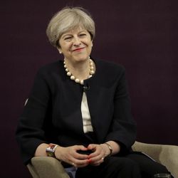British Prime Minister Theresa May smiles as she finishes a question and answer session after delivering a speech at the RSA (Royal Society for the encouragement of Arts, Manufactures and Commerce) in London, Tuesday, July 11, 2017. 