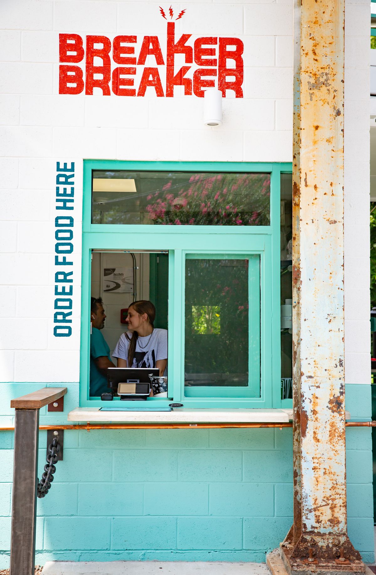 The takeout window on the patio at Breaker Breaker is open and ready to serve on the Beltline in Atlanta. 