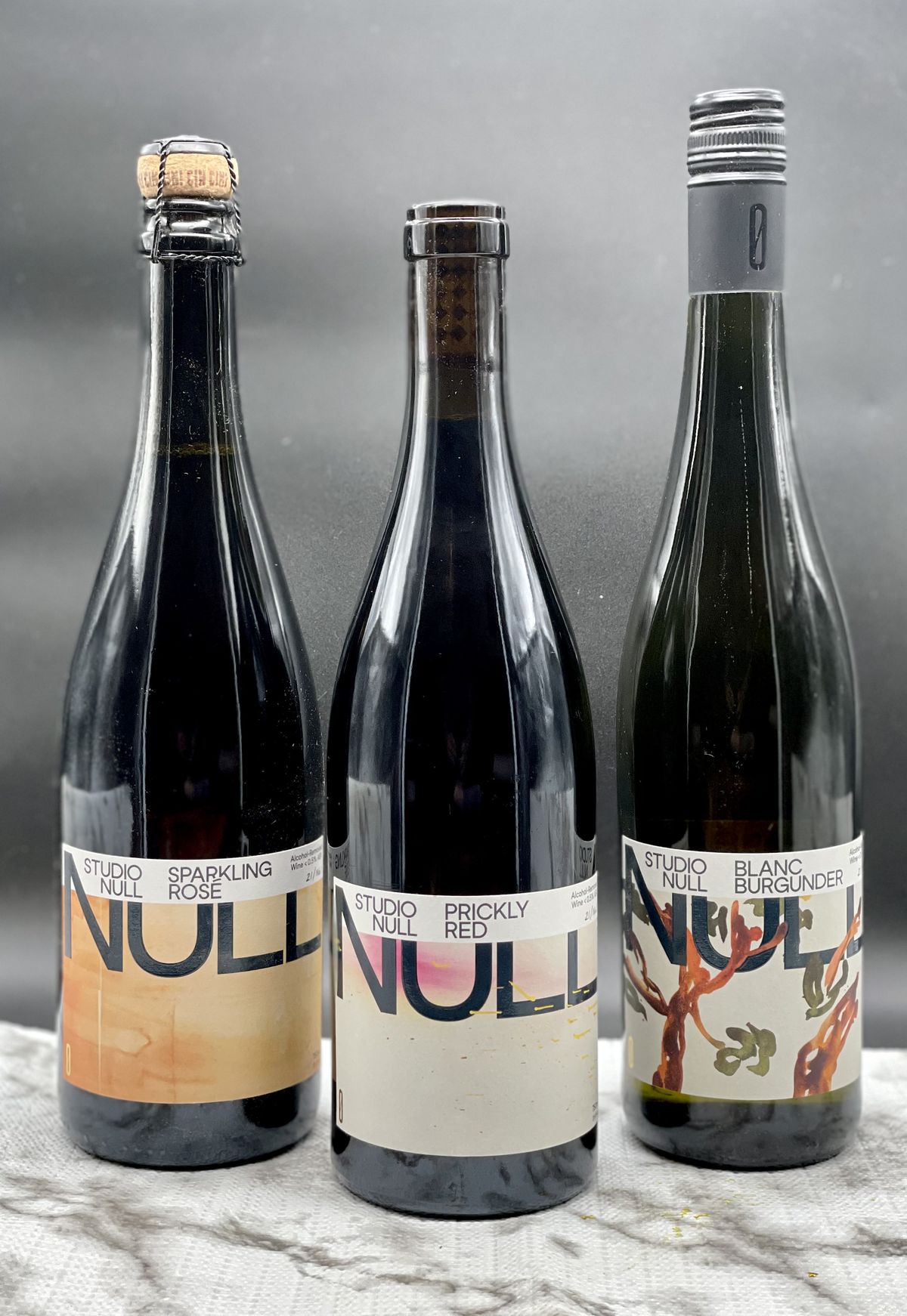 Three bottles of non-alcoholic wine from Studio Null. 