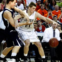 Former Lone Peak forward Talon Shumway (21) gets a loose ball during the Class 5A boys basketball championship game at the Maverik Center in West Valley on Saturday, March 3, 2012.
