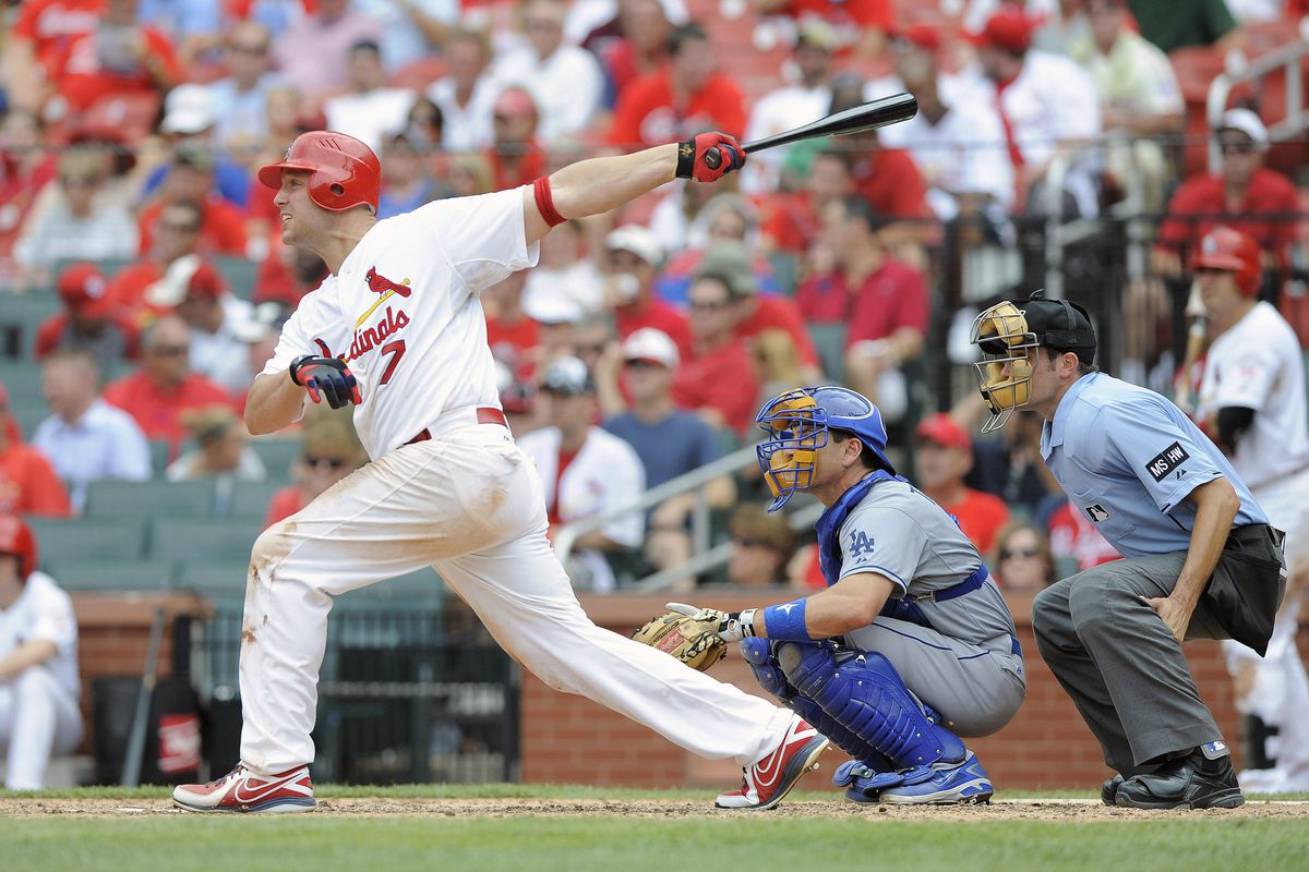 July 26, 2012; St. Louis, MO. USA; St. Louis Cardinals left fielder Matt Holliday (7) hits a solo home run in the sixth inning against the Los Angeles Dodgers at Busch Stadium. The Cardinals won 7-4. Mandatory Credit: Jeff Curry-US PRESSWIRE