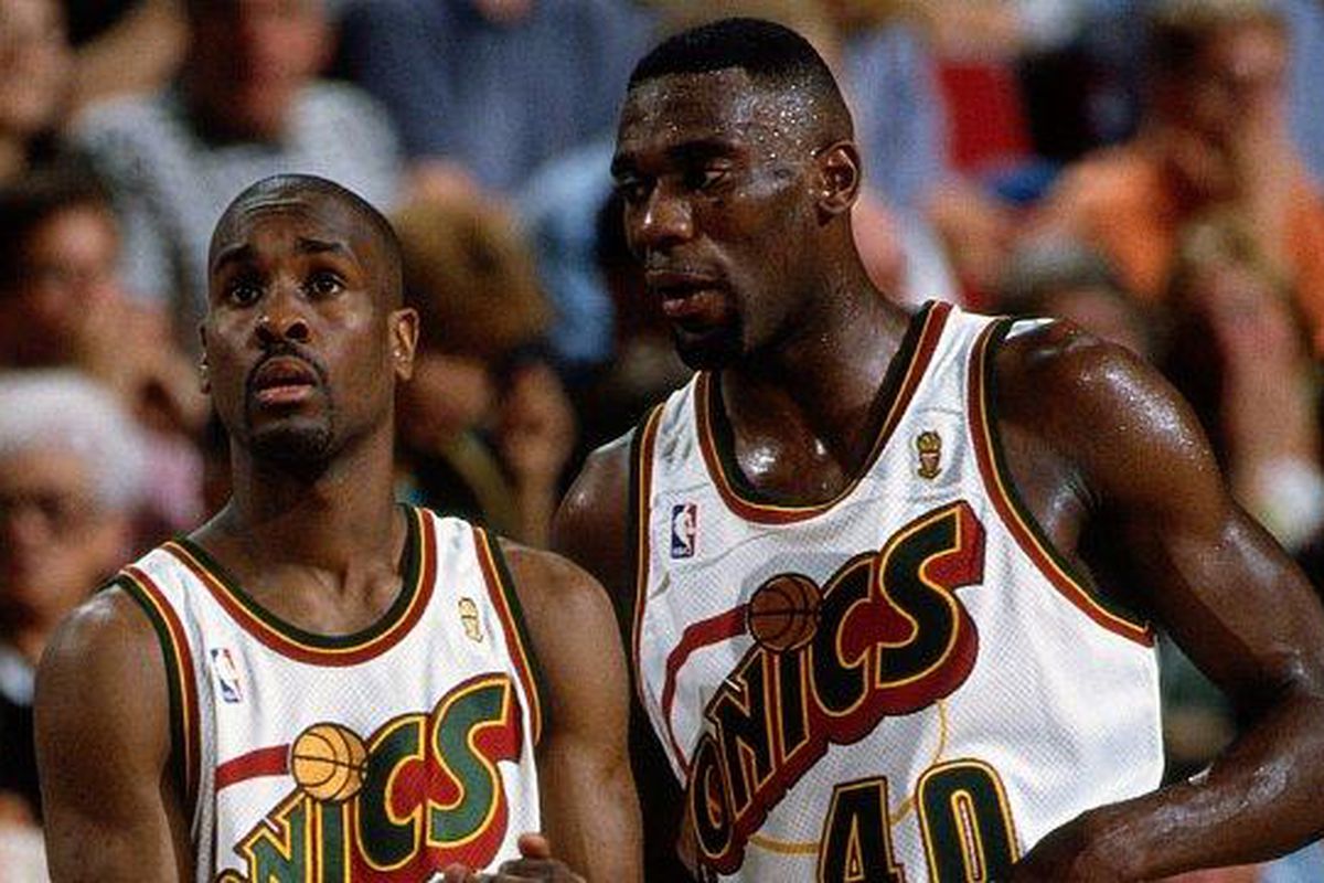 Payton (L) and Kemp (R) are stunned following the '96 Sonics Game 6 loss.