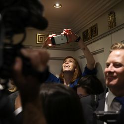 Jennie Taylor, center, widow of former North Ogden mayor and major in the U.S. Army National Guard Brent Taylor who was killed in Afghanistan in November 2018, takes a photo in a crowded elevator during a visit to the U.S. Capitol in Washington, D.C., on Feb. 6, 2019, as the guest of Rep. Rob Bishop, R-Utah.