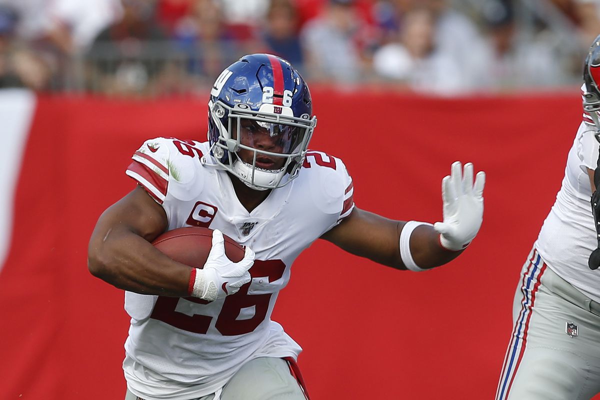 Running back Saquon Barkley of the New York Giants runs with the ball during the game against the Tampa Bay Buccaneers at Raymond James Stadium on September 22, 2019 in Tampa, Florida.