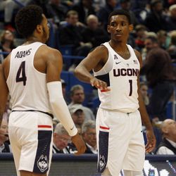 UConn's Christian Vital (1) and Jalen Adams (4) during the Monmouth Hawks vs UConn Huskies men's college basketball game at the XL Center in Hartford, CT on December 2, 2017.