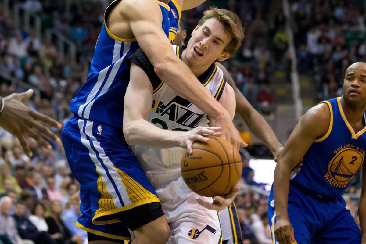 Andris Biedrins embraces new teammate Gordon Hayward after being traded to the Utah Jazz....probably.