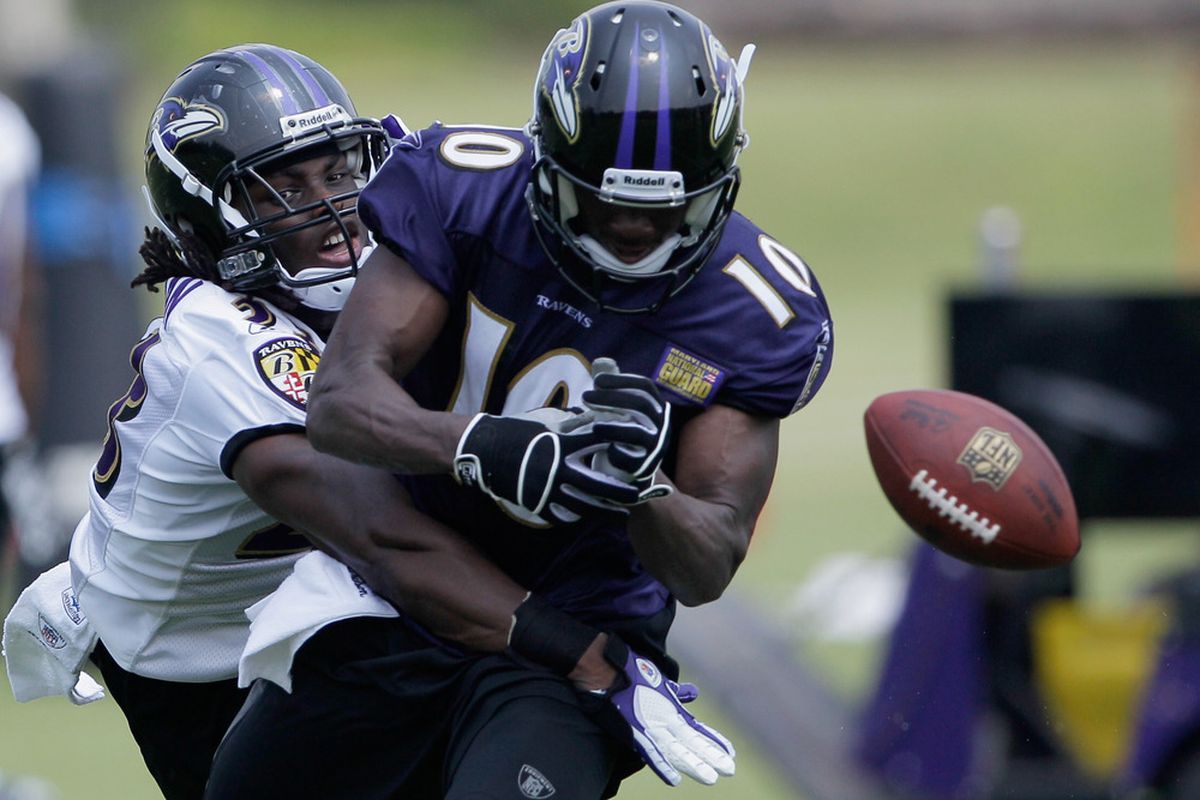OWINGS MILLS, MD - JULY 29: Josh Victorian #23 breaks up a pass intended for Rodney Bradley #10 of the Baltimore Ravens during a passing drill at training camp on July 29, 2011 in Owings Mills, Maryland.  (Photo by Rob Carr/Getty Images)