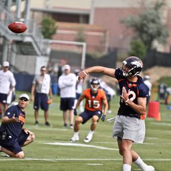Paxton Lynch, QB for the Denver Broncos, releases his pass on the first day of training camp.