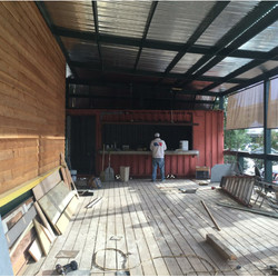 Outdoor patio with bar made form shipping container