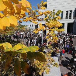Crowds leave the opening session of the 183rd Semiannual General Conference of the Church of Jesus Christ of Latter-day Saints Saturday, Oct. 5, 2013, in Salt Lake City.