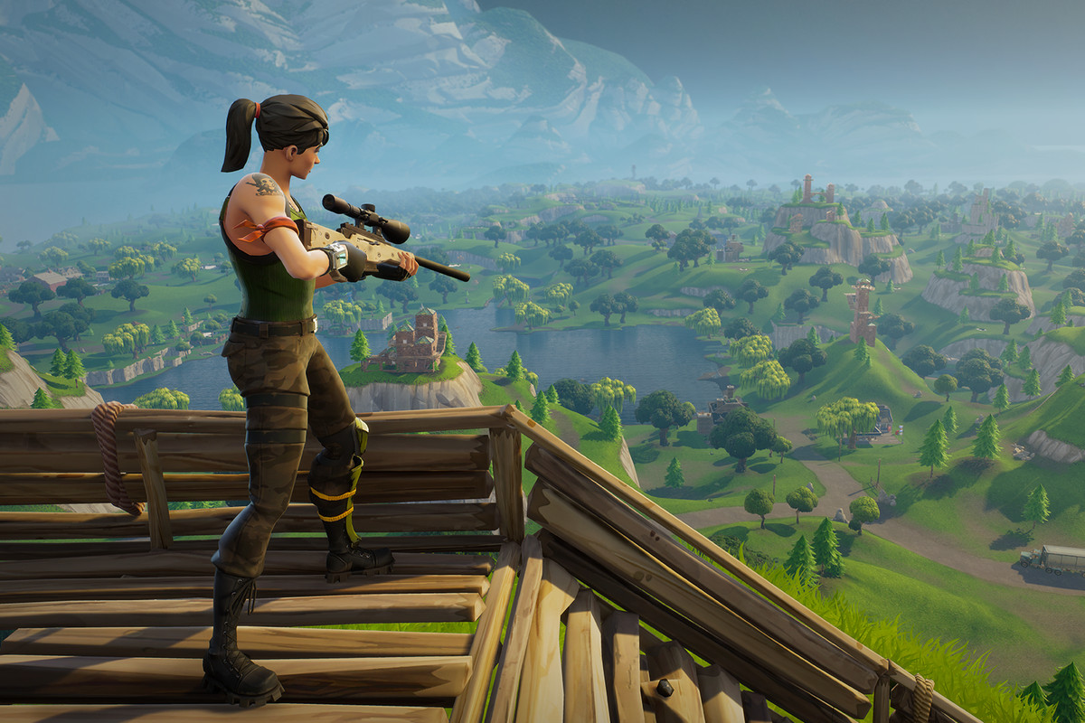 Fortnite - woman standing on a wooden structure with a sniper rifle