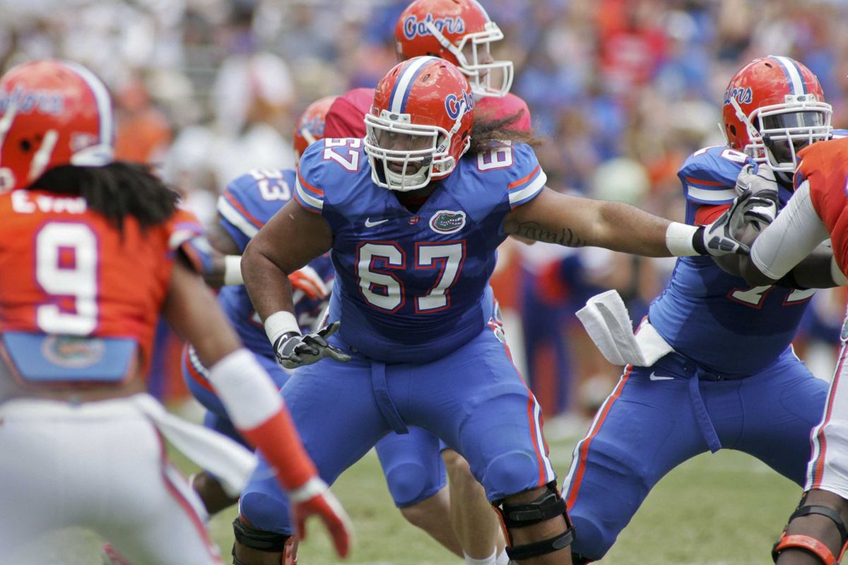 April 7, 2012; Gainesville FL, USA; Florida Gators guard Jon Halapio (67) protects the line during the first half of the Florida-Spring Game at Ben Hill Griffin Stadium. Mandatory Credit: Phil Sears-US PRESSWIRE