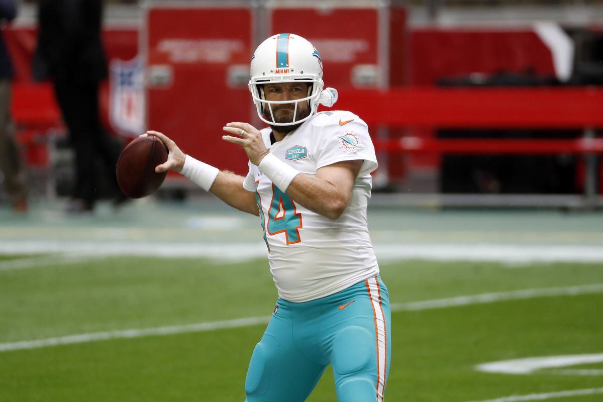Quarterback Ryan Fitzpatrick #14 of the Miami Dolphins warms up before the NFL game against the Arizona Cardinals at State Farm Stadium on November 08, 2020 in Glendale, Arizona.