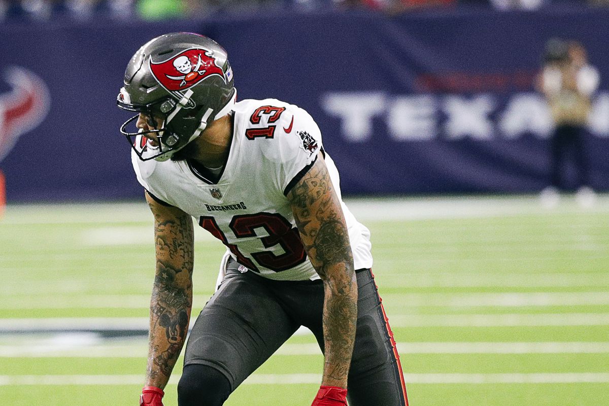 Mike Evans #13 of the Tampa Bay Buccaneers lines up against the Houston Texans during a NFL preseason game at NRG Stadium on August 28, 2021 in Houston, Texas.