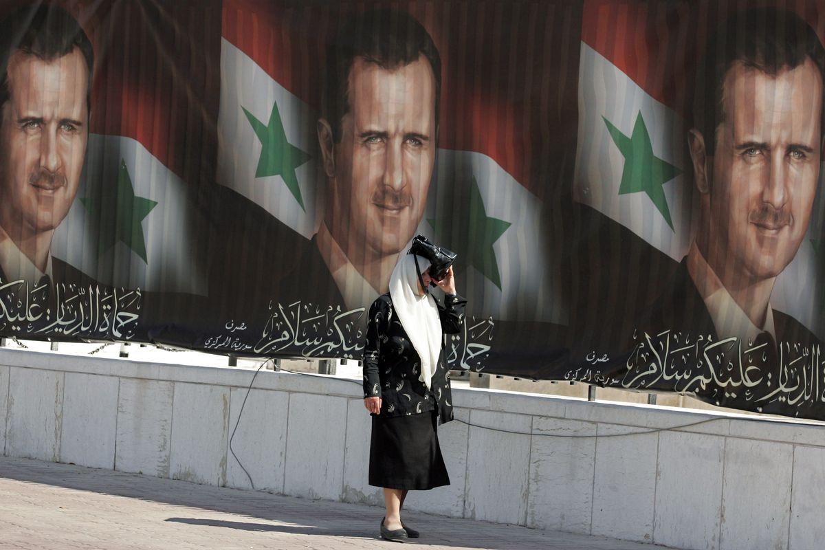 Posters of Bashar al-Assad hang in Damascus.