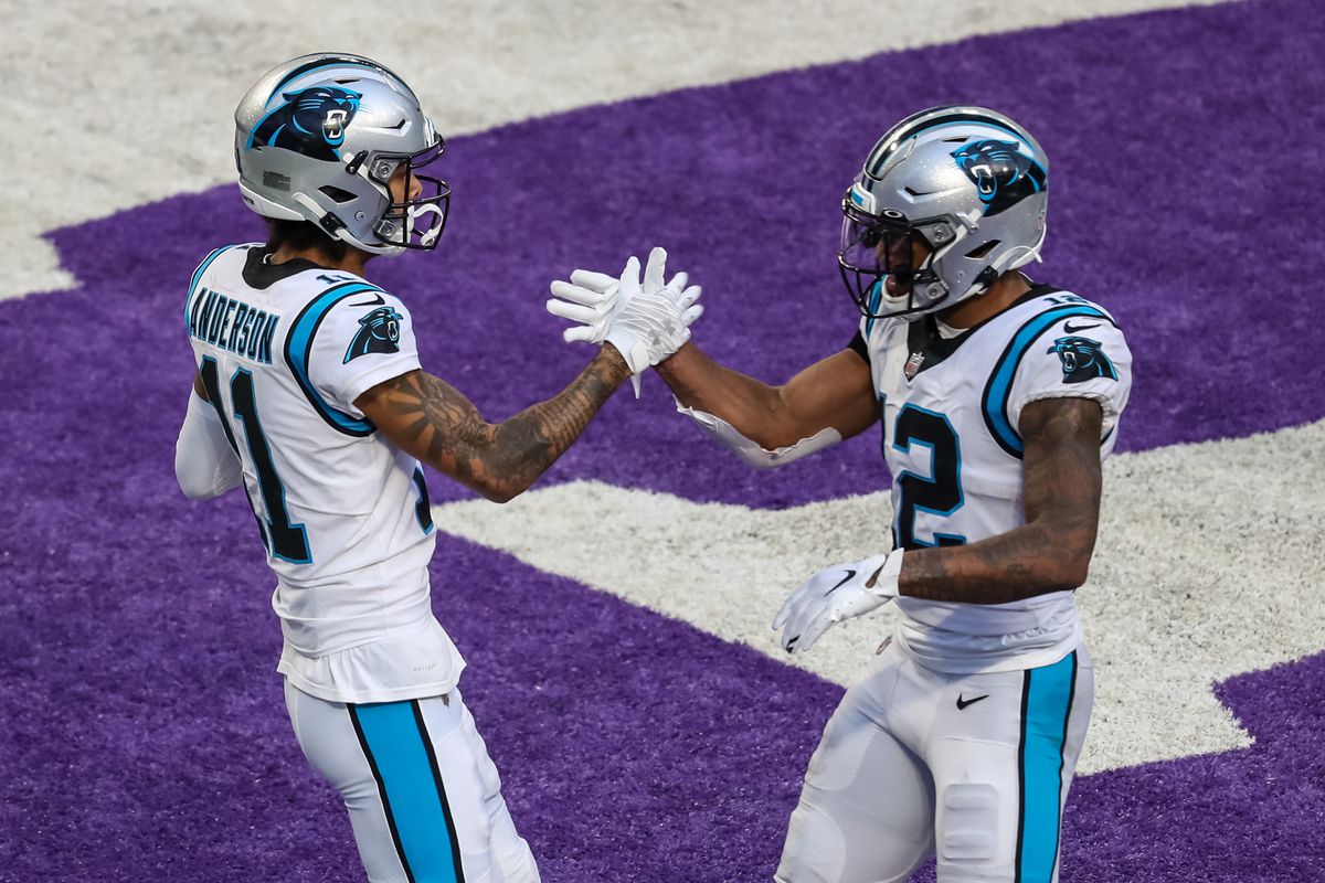 Carolina Panthers wide receiver Robby Anderson celebrates with wide receiver D.J. Moore after scoring a touchdown against the Minnesota Vikings during the second quarter at U.S. Bank Stadium.