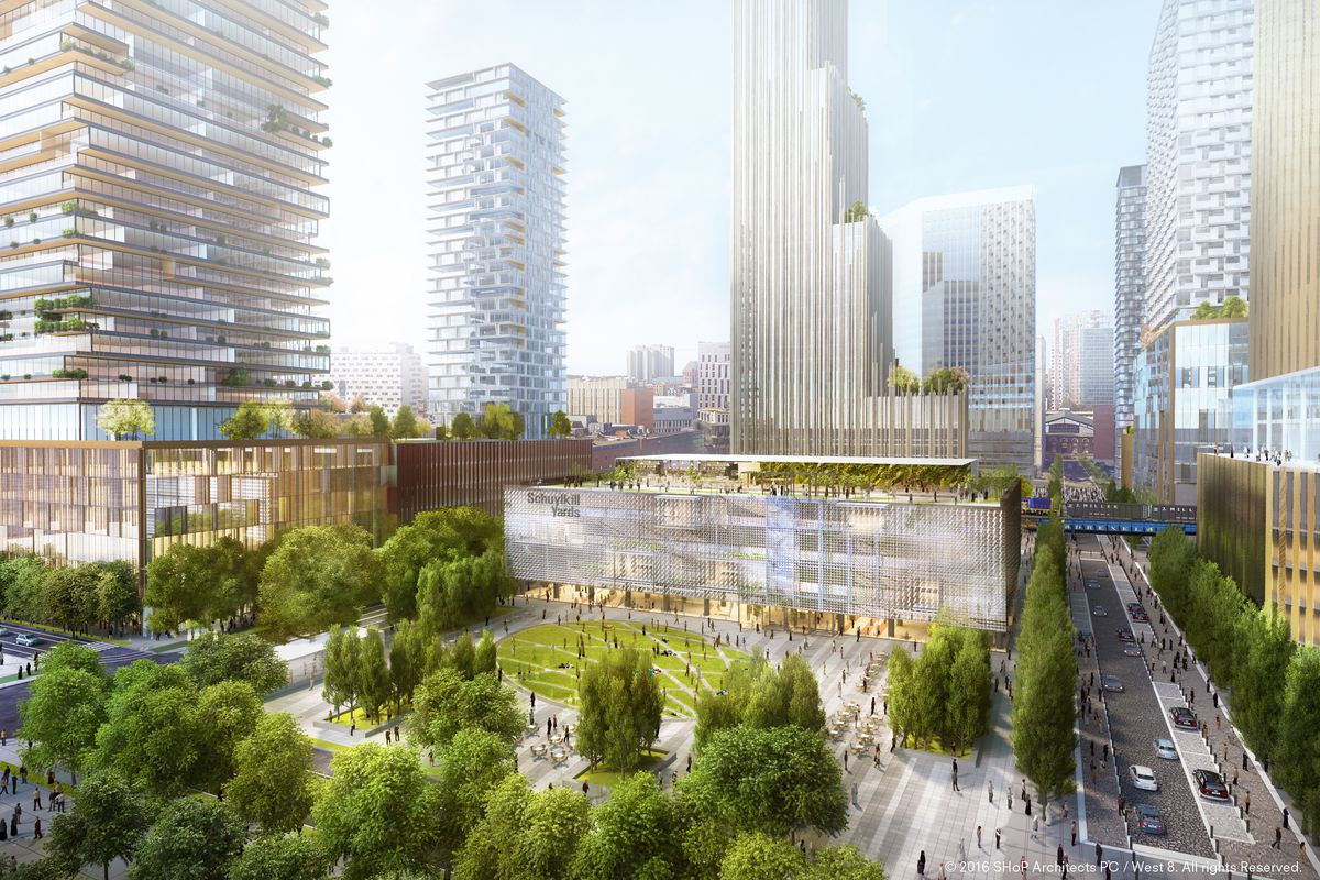 A rendering of Schuylkill Yards in Philadelphia. In the foreground is a park with trees and a lawn. In the distance are tall skyscrapers and buildings.