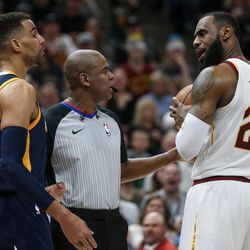 Utah Jazz forward Thabo Sefolosha (22) and Cleveland Cavaliers forward LeBron James (23) are each charged with technical fouls after getting in each other's face at Vivint Arena in Salt Lake City on Saturday, Dec. 30, 2017.