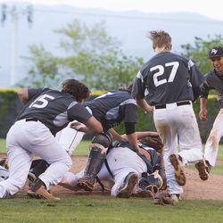 Pine View celebrates after winning the 3A baseball state championship 4-3 in Kearns on Saturday, May, 21, 2016.