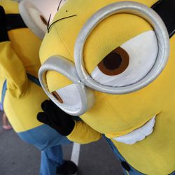 Minions participate in a freeze dance contest at the Farmington Family Night as part of the 9th annual Be Well Utah outside of the Farmington Health Center in Farmington on Monday, Aug. 21, 2017.