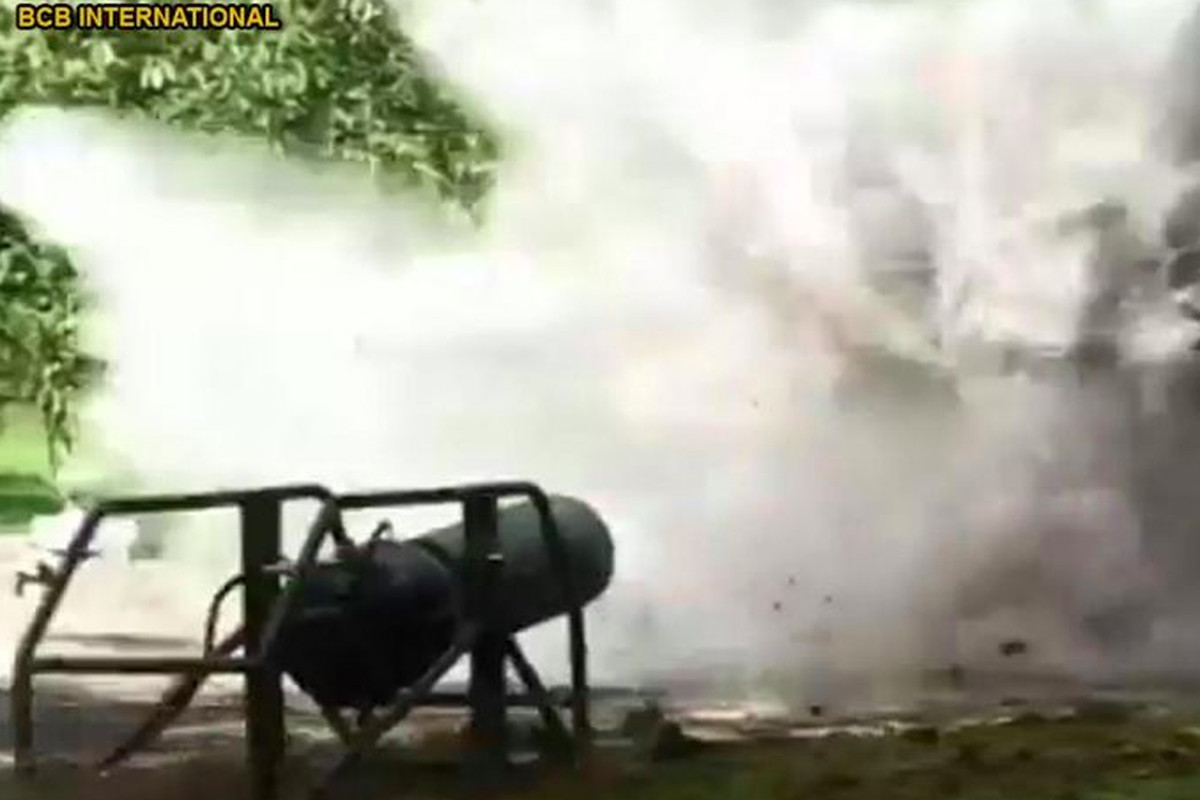 A cannon blowing up a wall.