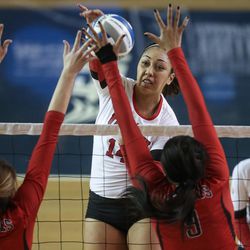 Utah outside hitter Adora Anae (14) puts the ball over the net during an NCAA first round match against UNLV at Smith Fieldhouse in Provo on Friday, Dec. 2, 2016.