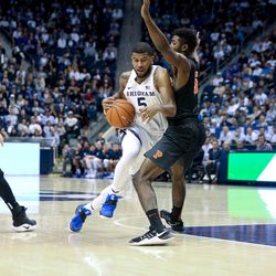 BYU guard L.J. Rose (5) takes the ball down the court past Princeton guard Amir Bell (5) during an NCAA college basketball game Monday, Nov. 14, 2016, in Provo, Utah. (Sammy Jo Hester/The Daily Herald via AP)