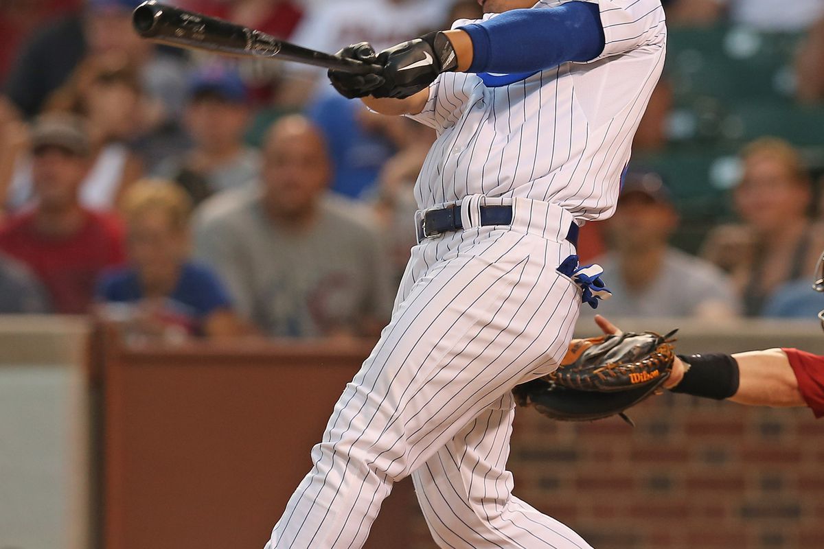 Darwin Barney of the Chicago Cubs hits a single against the Arizona Diamondbacks at Wrigley Field in Chicago, Illinois. (Photo by Jonathan Daniel/Getty Images)