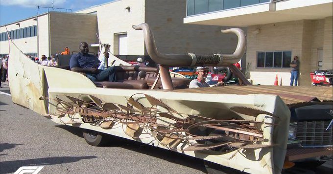Shaq rode to the F1 podium in a giant Mad Max longhorn death machine