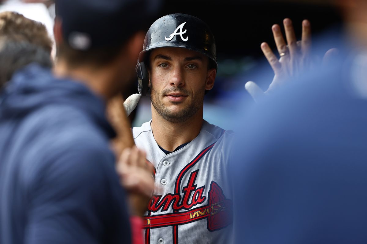 Matt Olson #28 of the Atlanta Braves is congratulated after he hit a three run home run against the New York Mets during the sixth inning of game one of a doubleheader at Citi Field on August 12, 2023 in New York City.