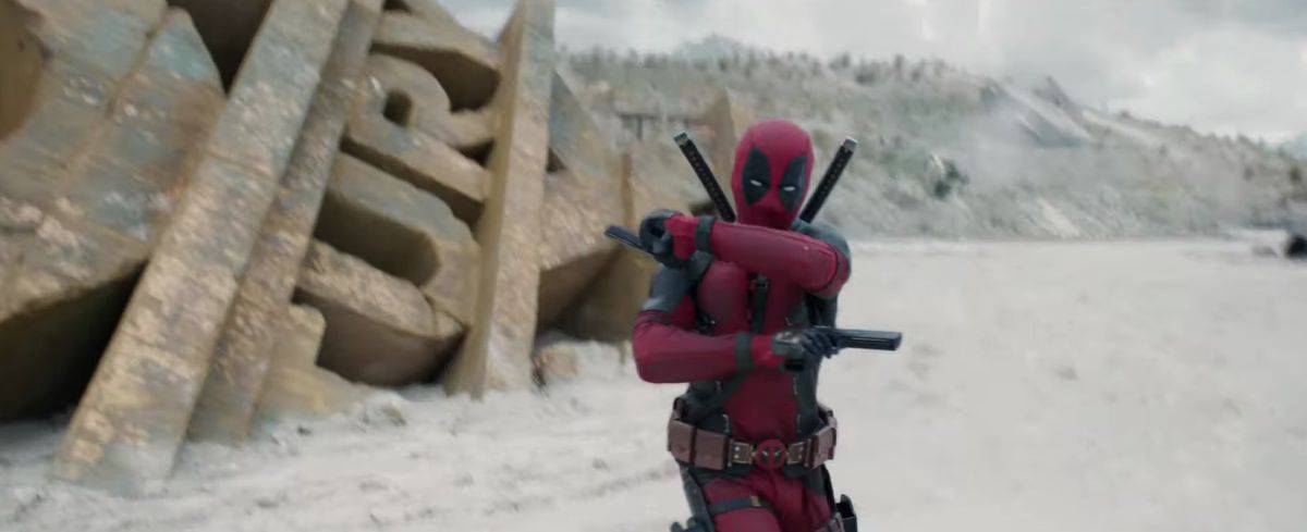 Deadpool fights in front of a giant 20th Century Fox logo in Deadpool &amp; Wolverine